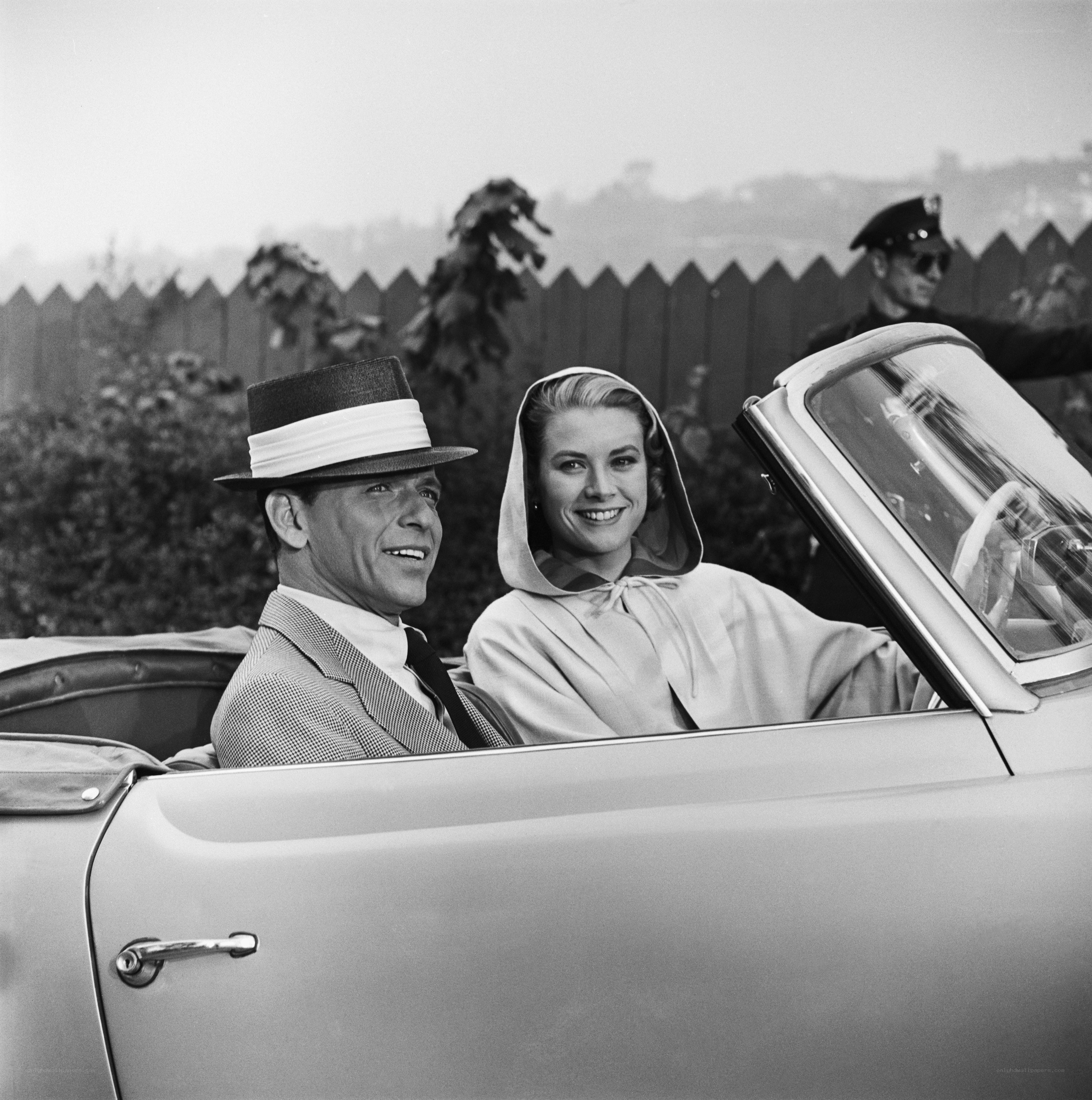 Couple in a convertible car