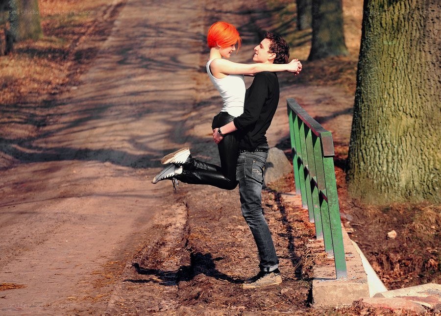 Couple in a park embrace