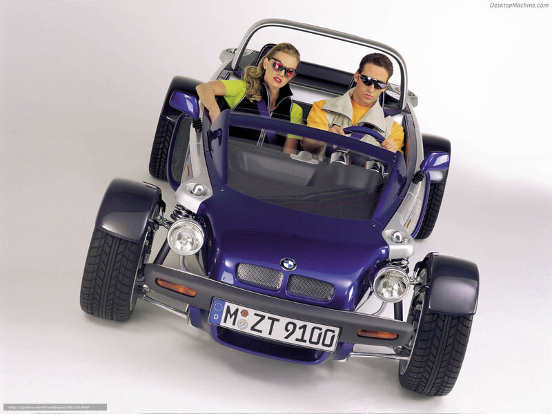 Couple in a purple BMW roadster