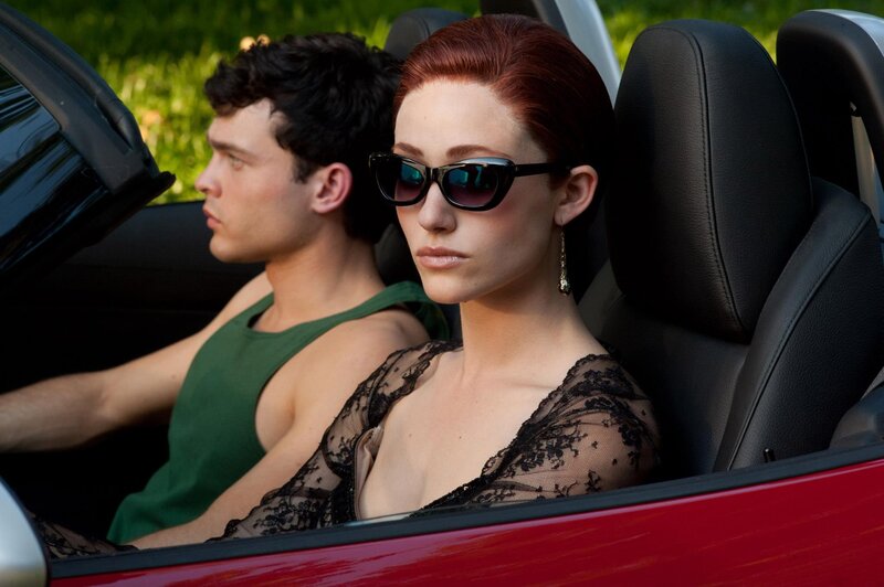 Couple in a red convertible