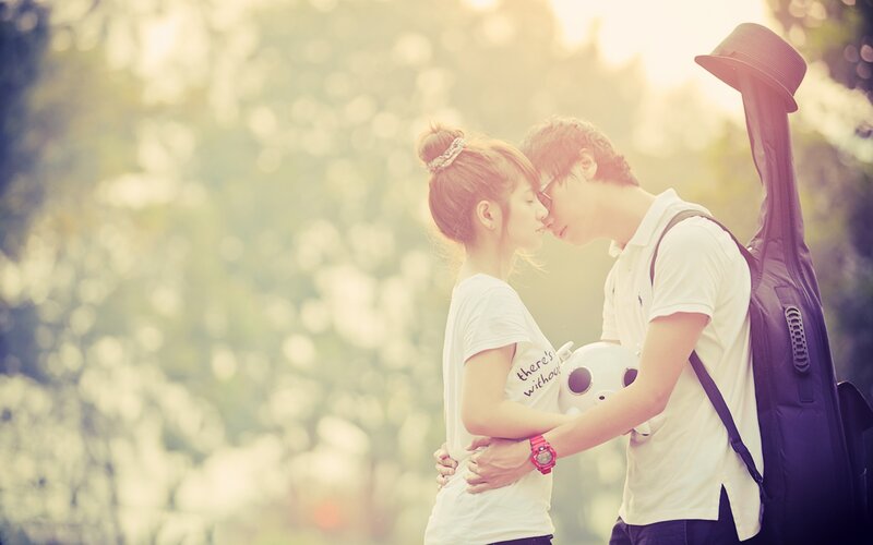 Couple in a sunlit embrace