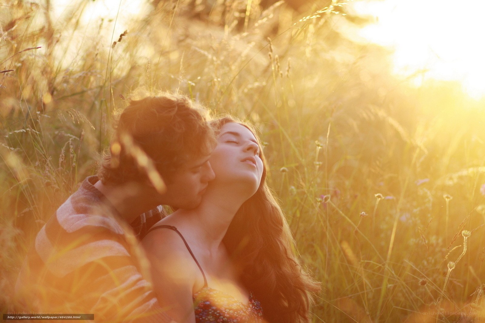Couple in a sunlit field
