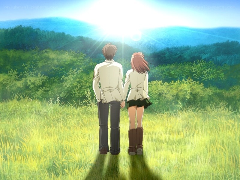 couple in a sunlit field