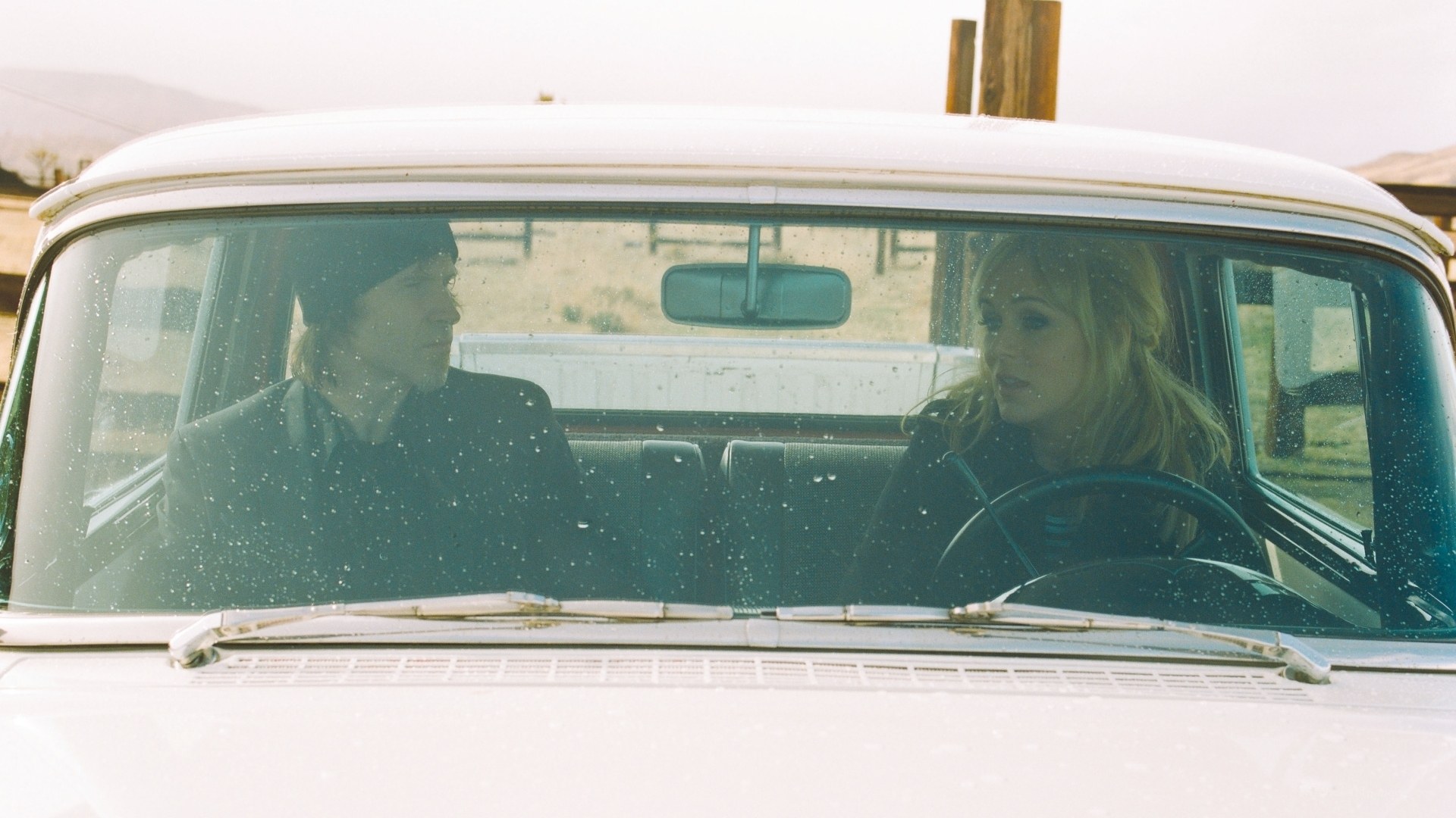 Couple in a vintage car