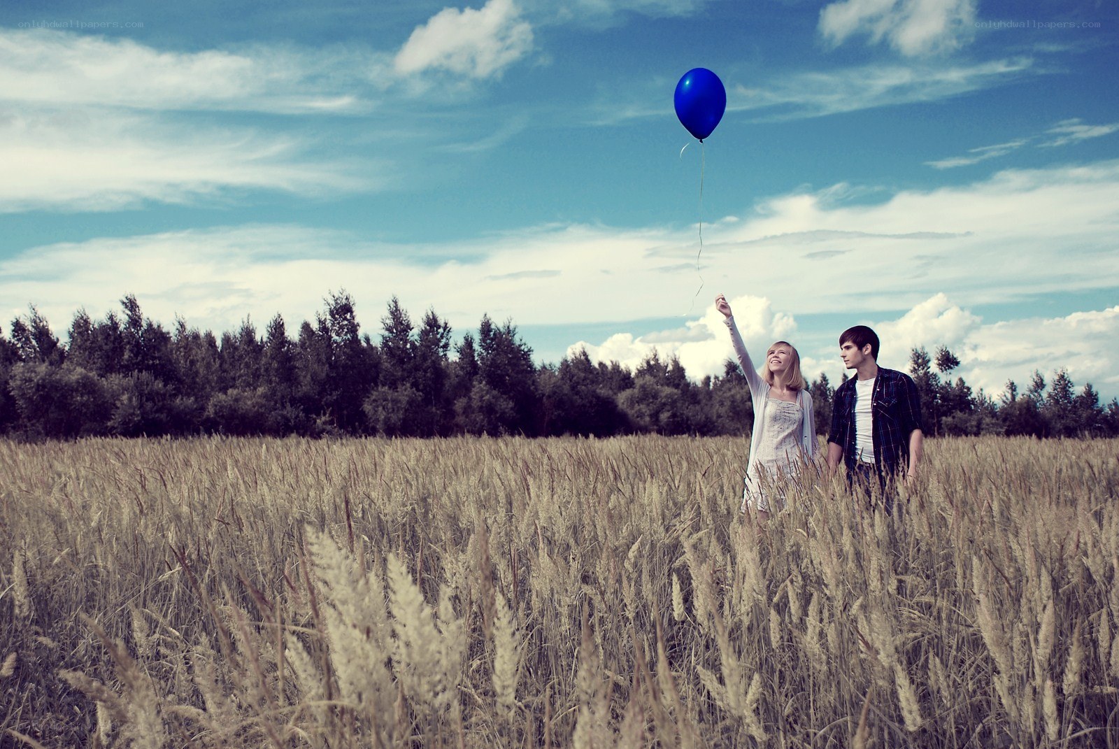 Couple in a wheat field