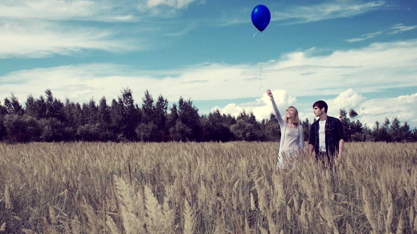 Couple in a wheat field