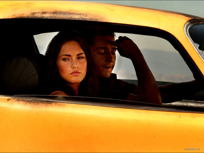 Couple in a yellow car