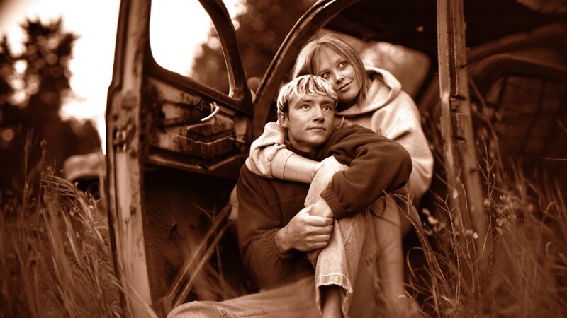 Couple in an old car