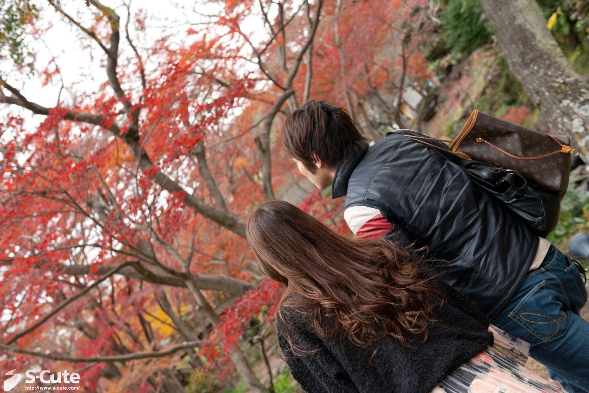 Couple in autumn foliage