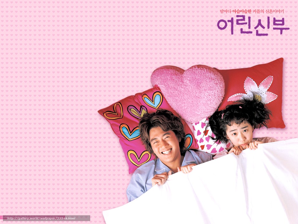 couple in bed with pillows