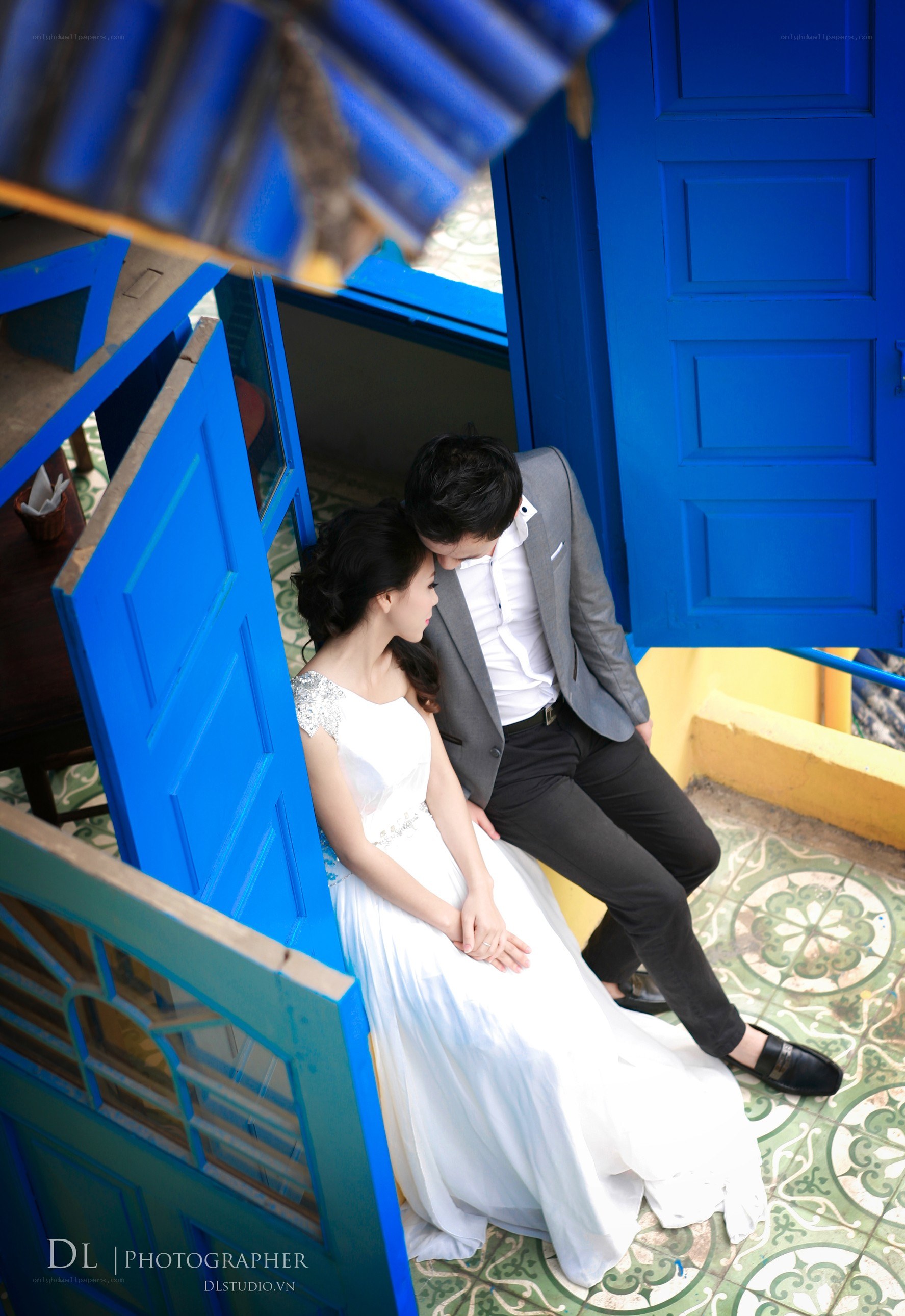 Couple in blue doorway