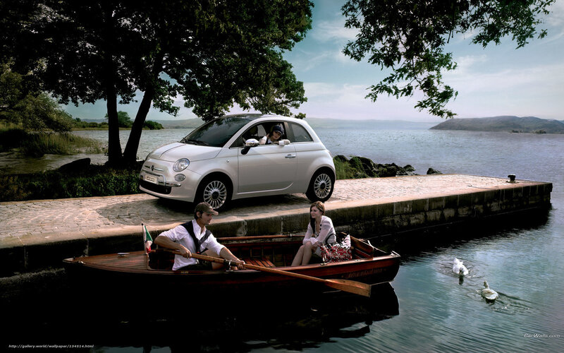 Couple in boat near car