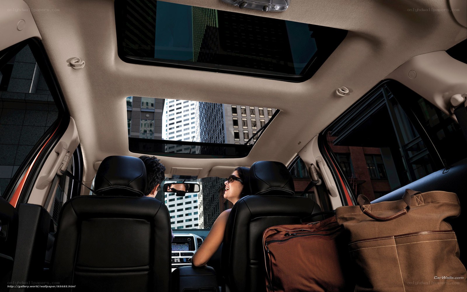Couple in car with sunroof
