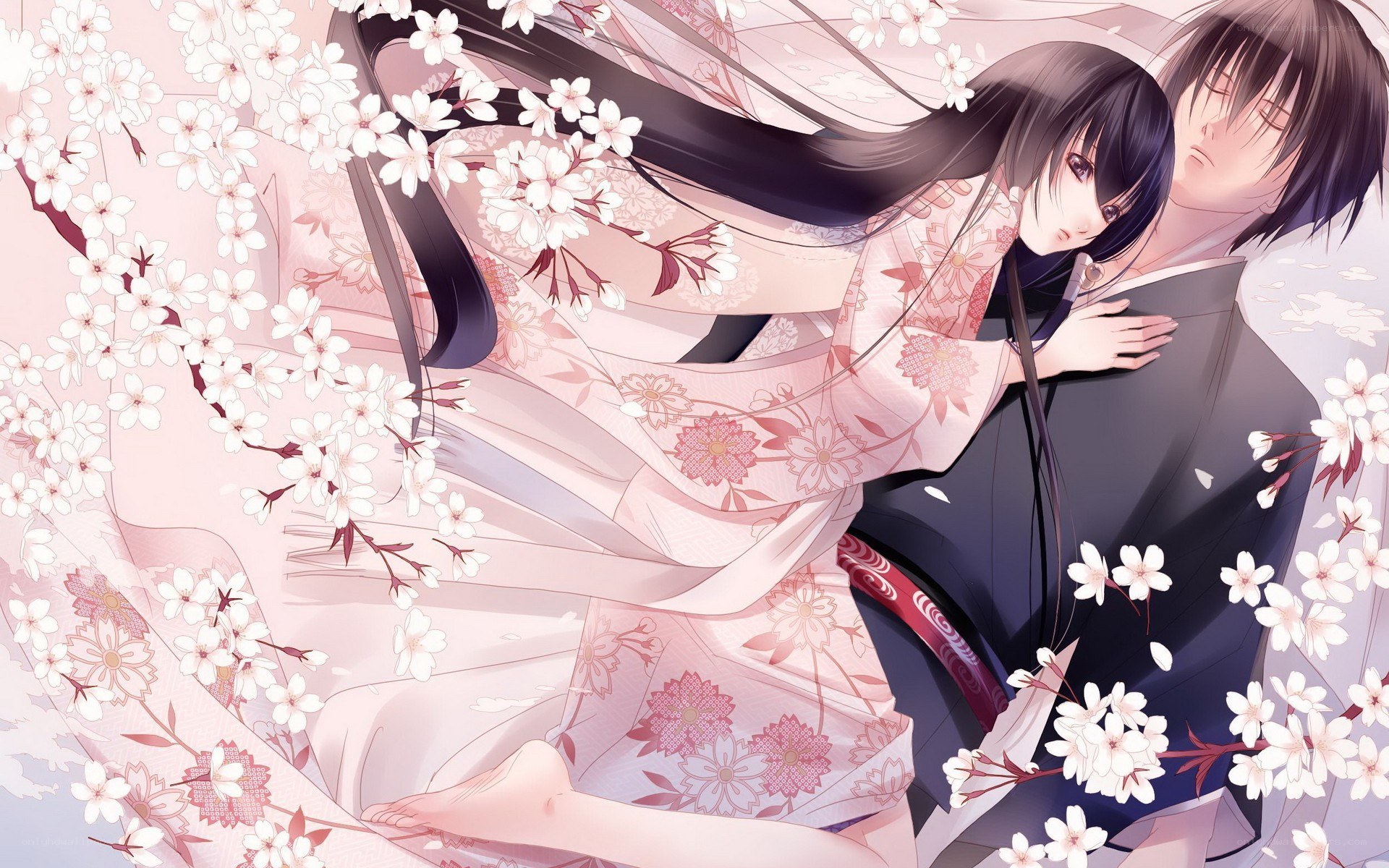 couple in cherry blossoms