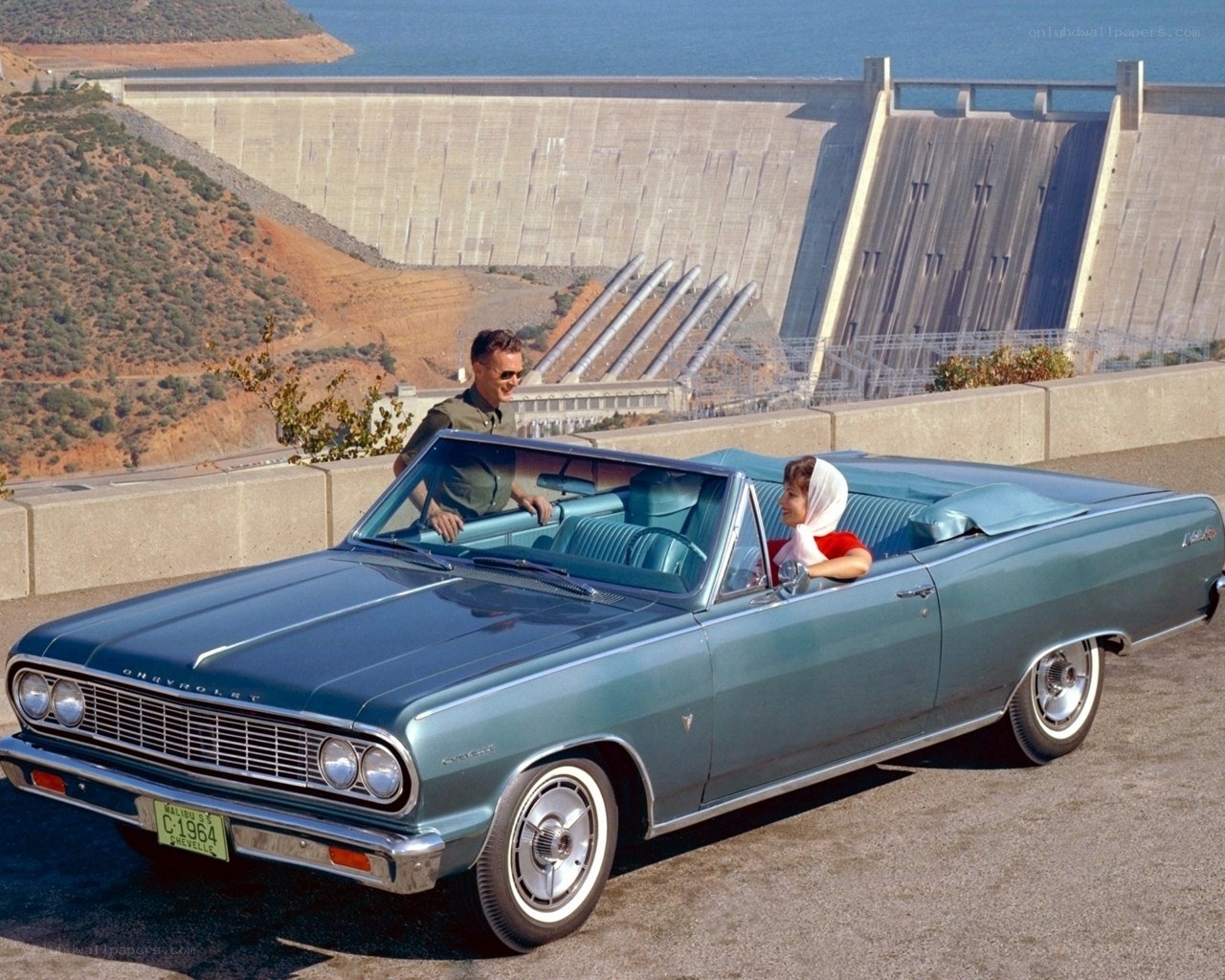 Couple in classic convertible