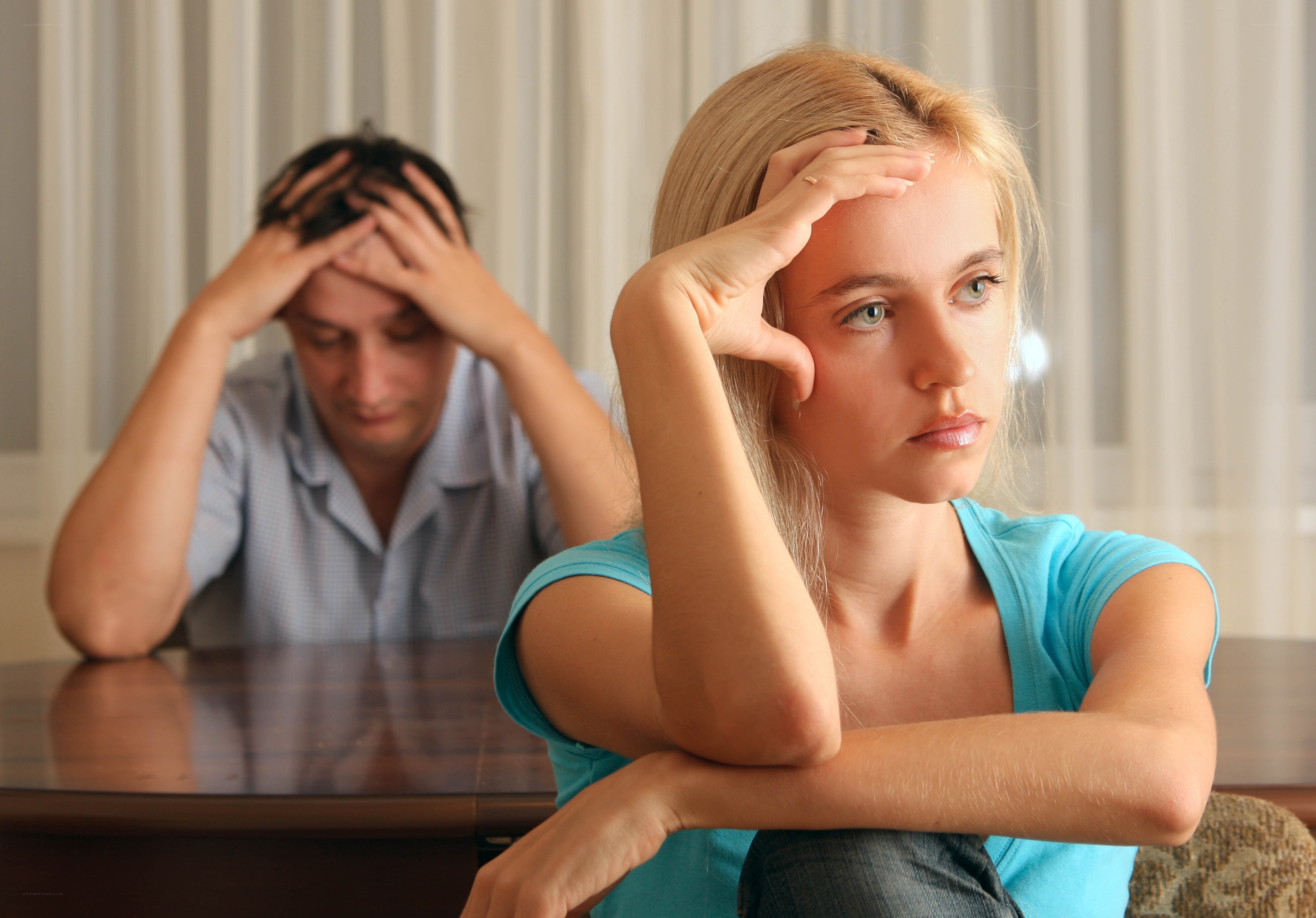 couple in conflict at table