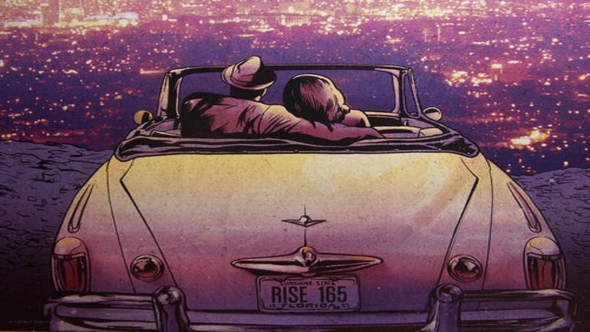 couple in convertible at night