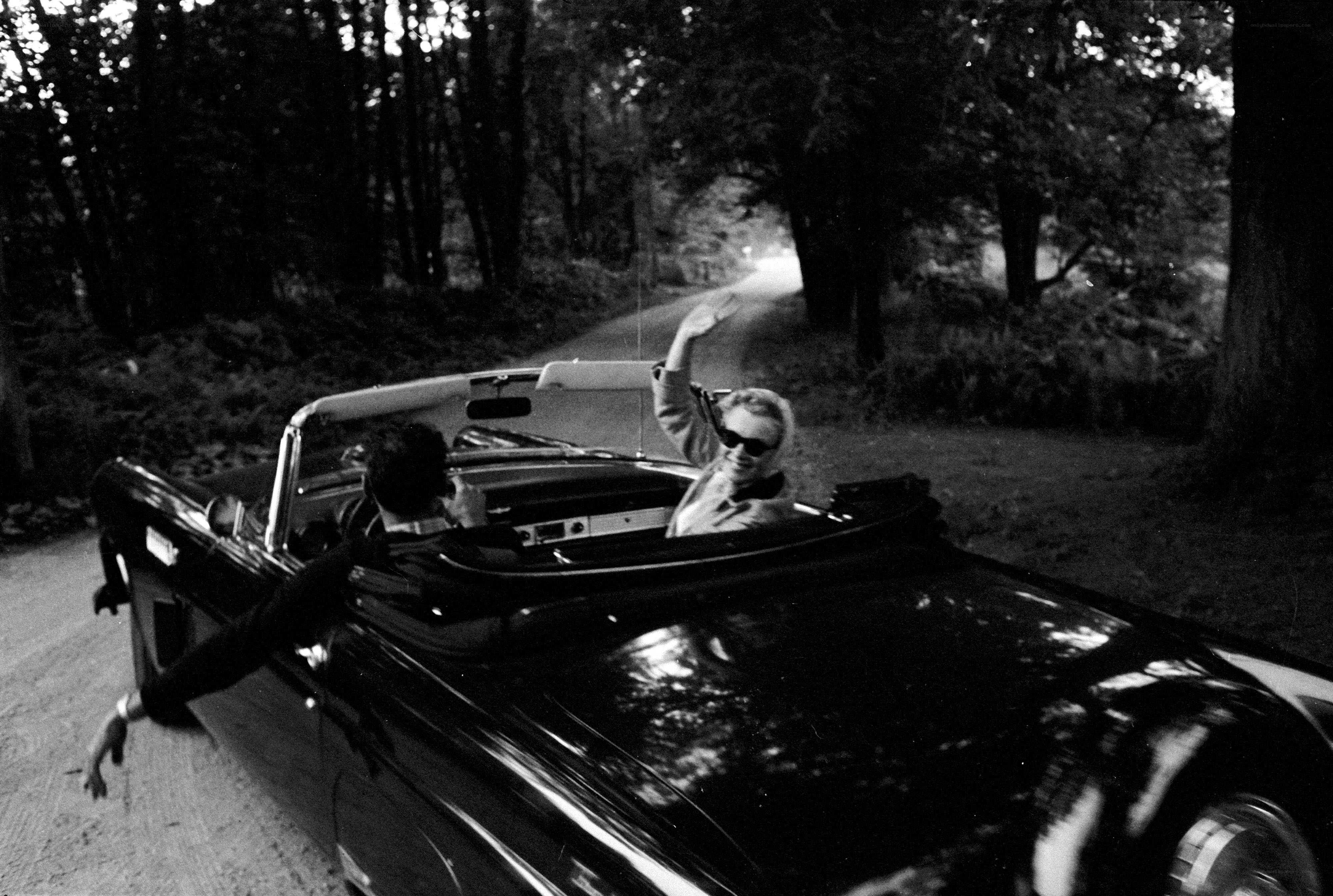 Couple in convertible car