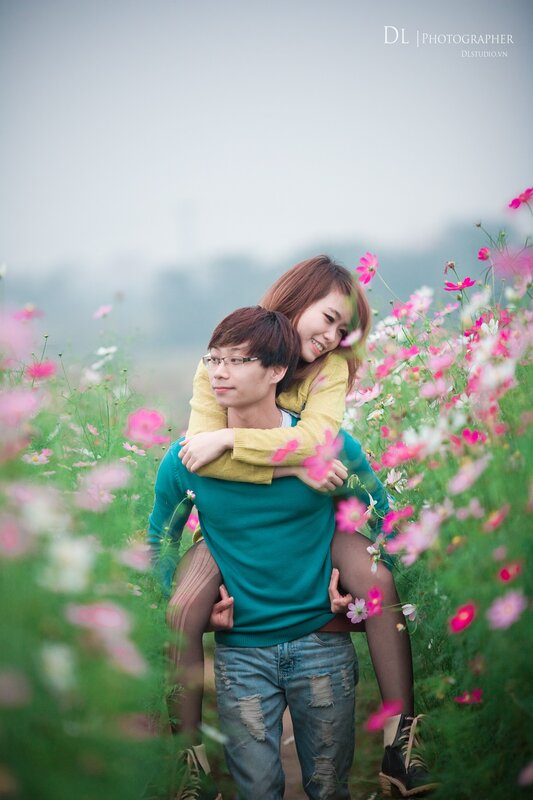 Couple in Flower Field — Pink, Romantic, Spring, Photograph, Flowers, Sweaters