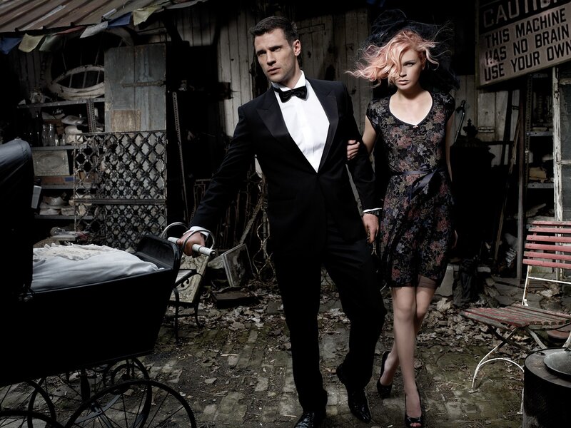 Couple in formal wear in junkyard