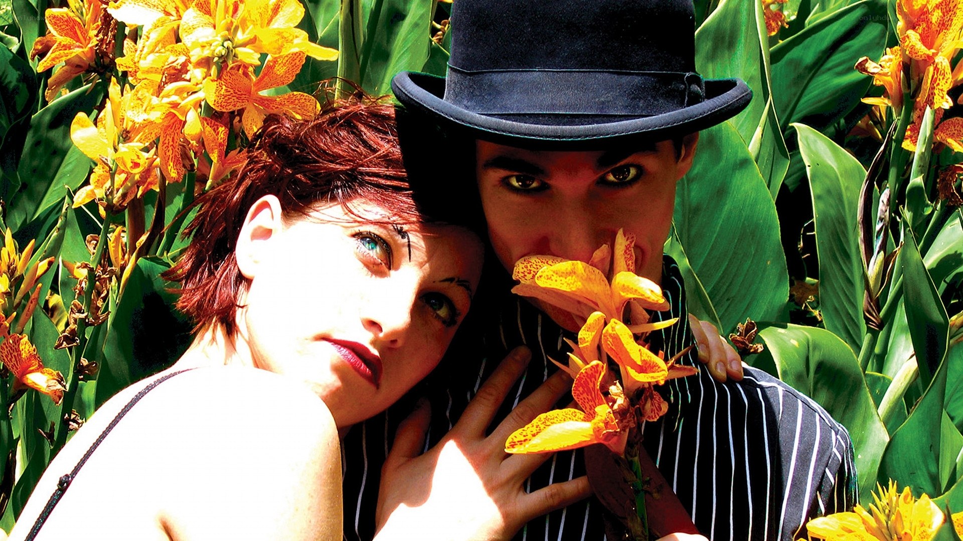 Couple in garden with flowers