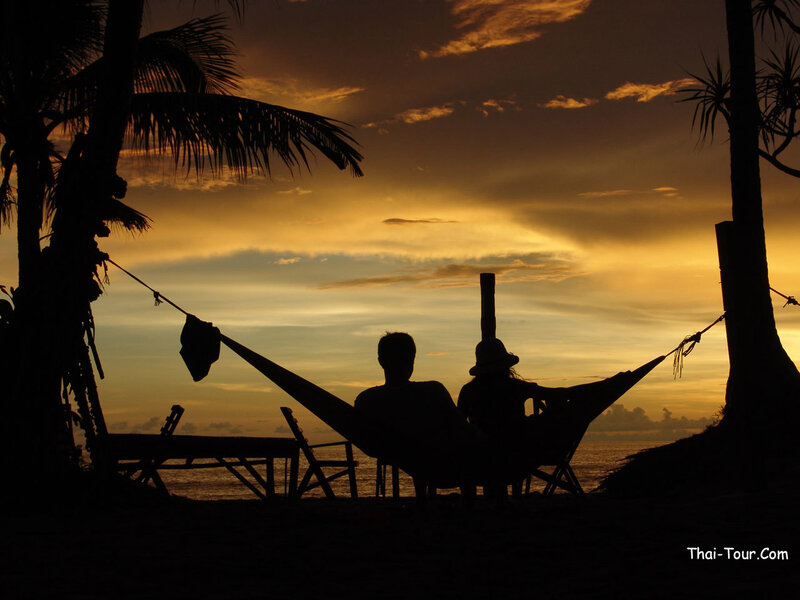 Couple in hammock at sunset