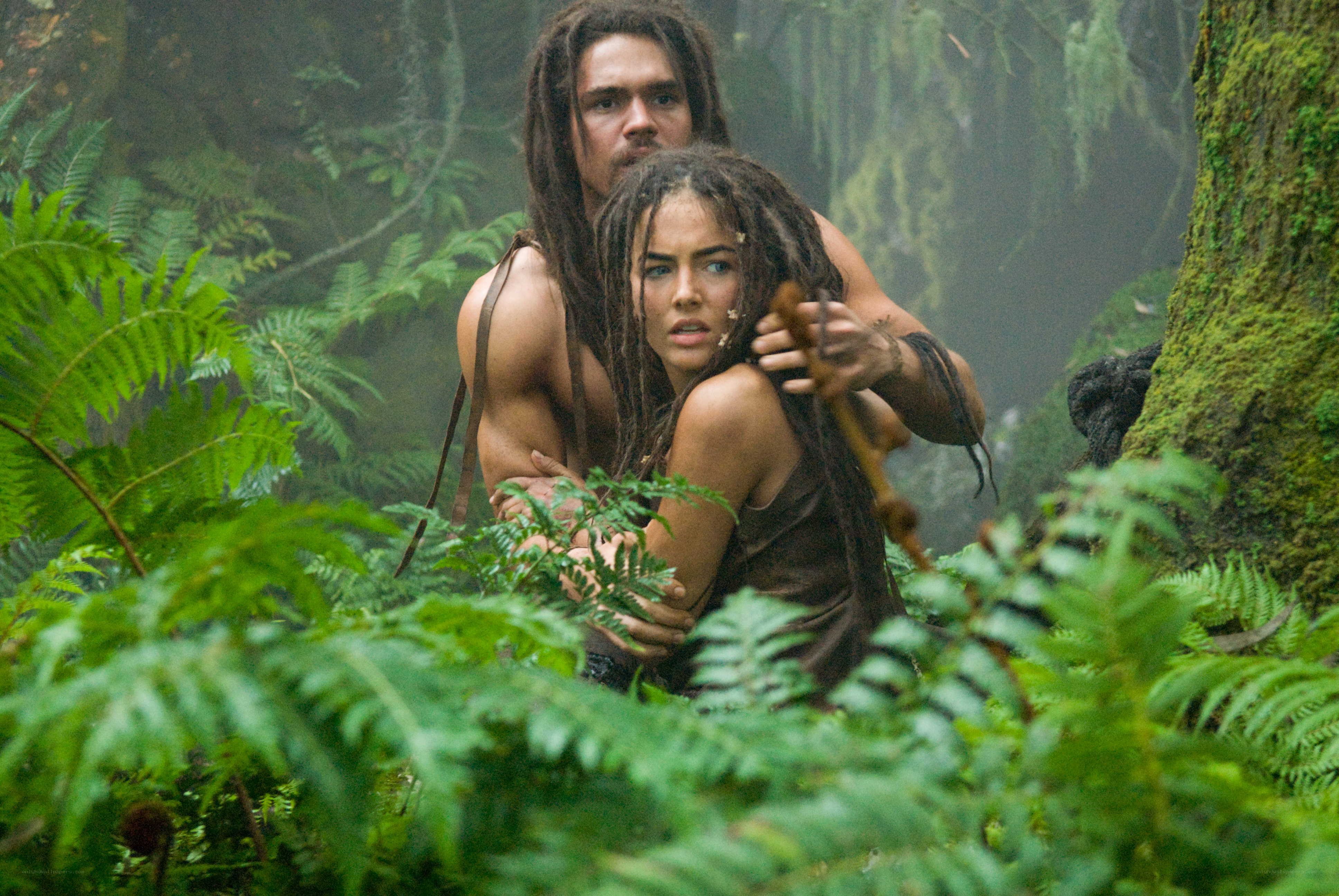 Couple in jungle foliage