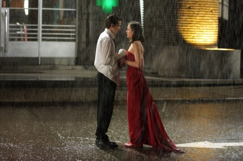 couple in rain at night