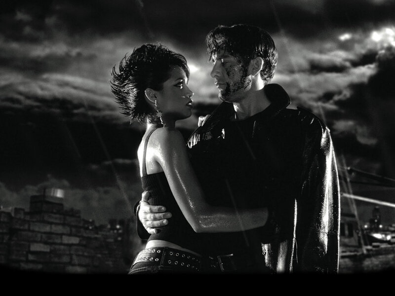 couple in rain embrace