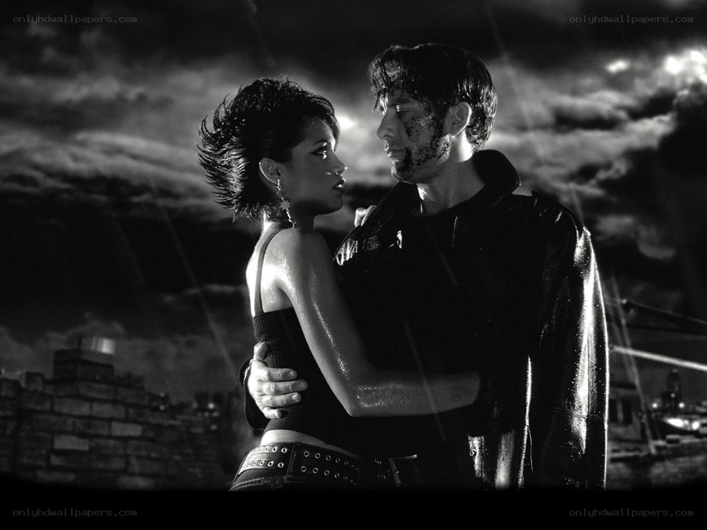 couple in rain embrace