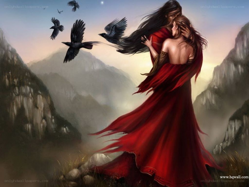 Couple in red cloak on mountain