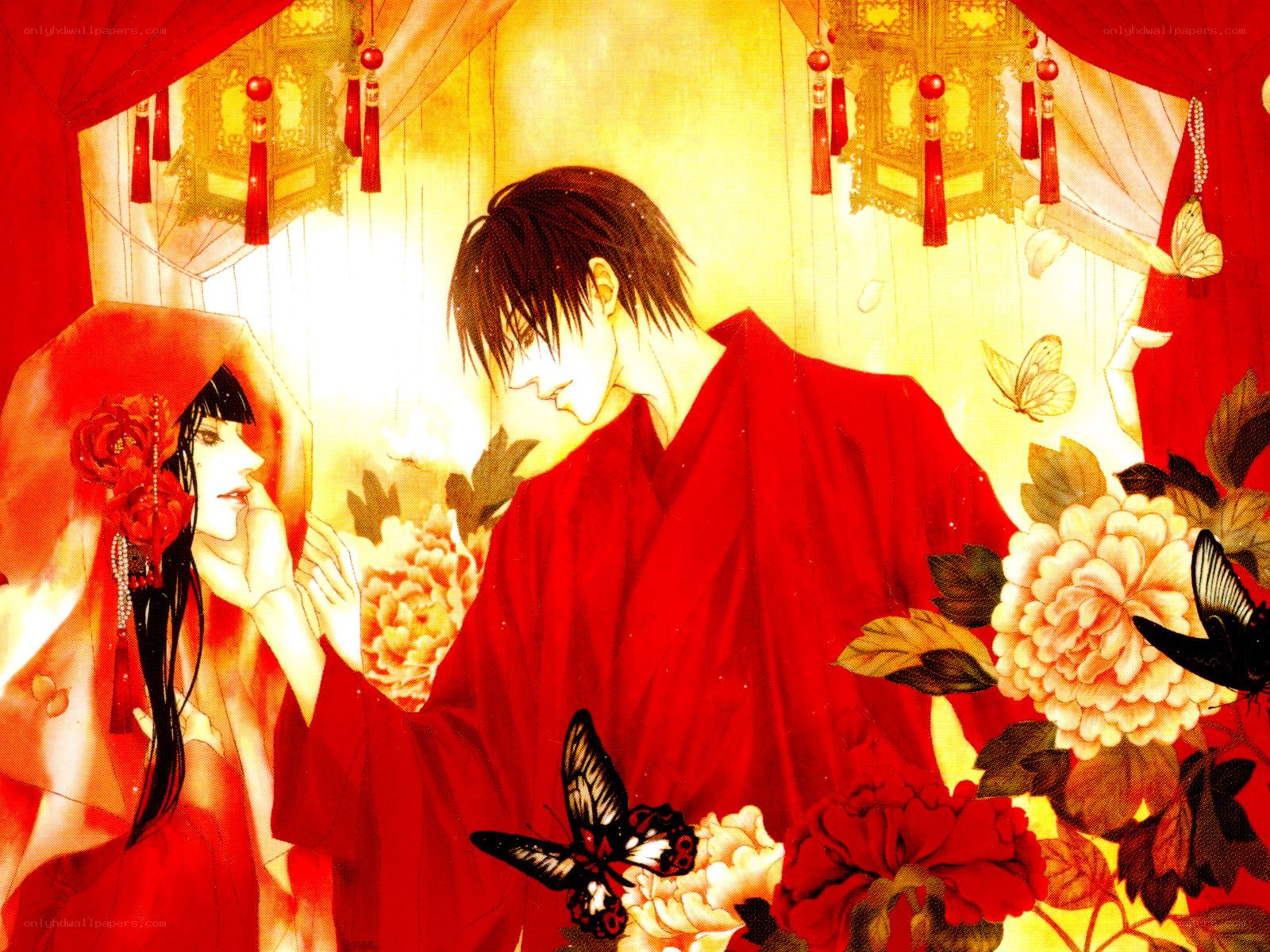 Couple in red wedding attire