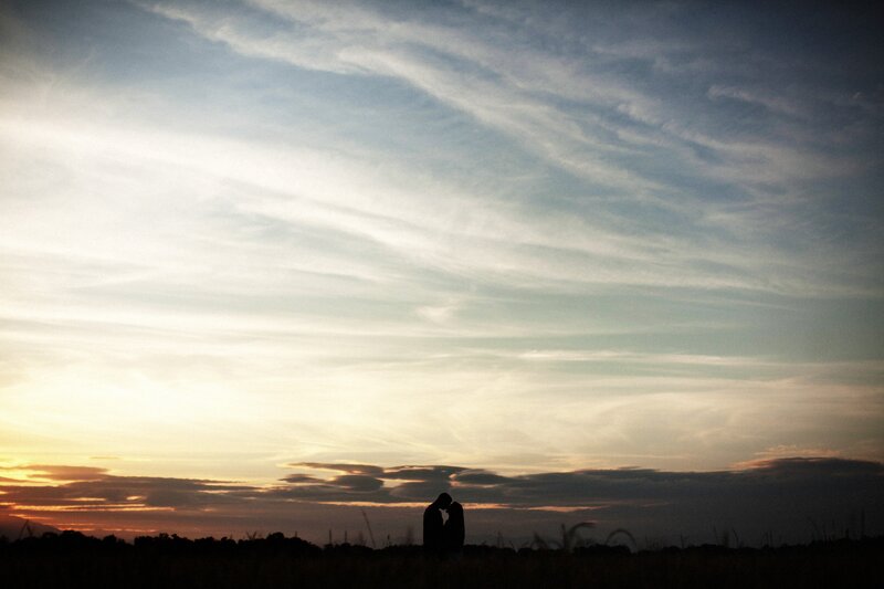 Couple in Silhouette — Blue, Serene, Sunset