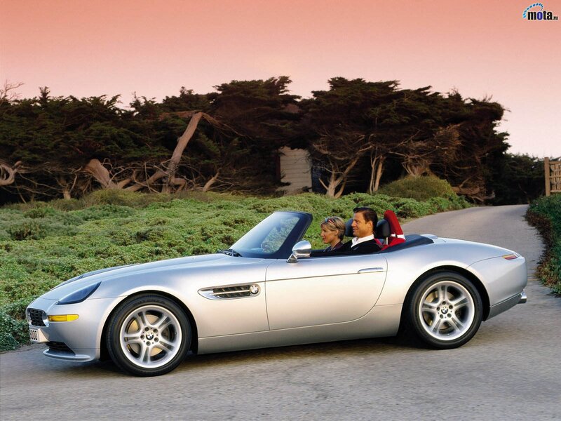 Couple in silver convertible