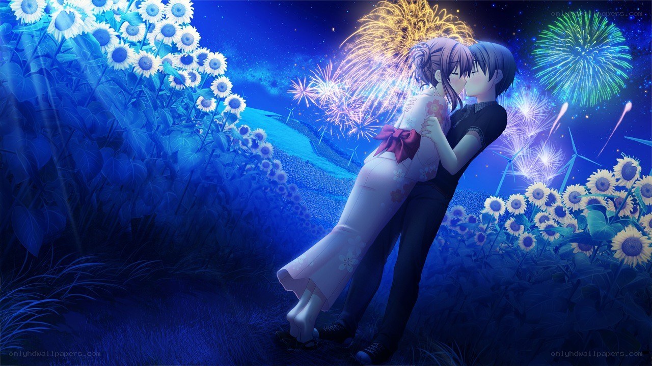 couple in sunflower field at night