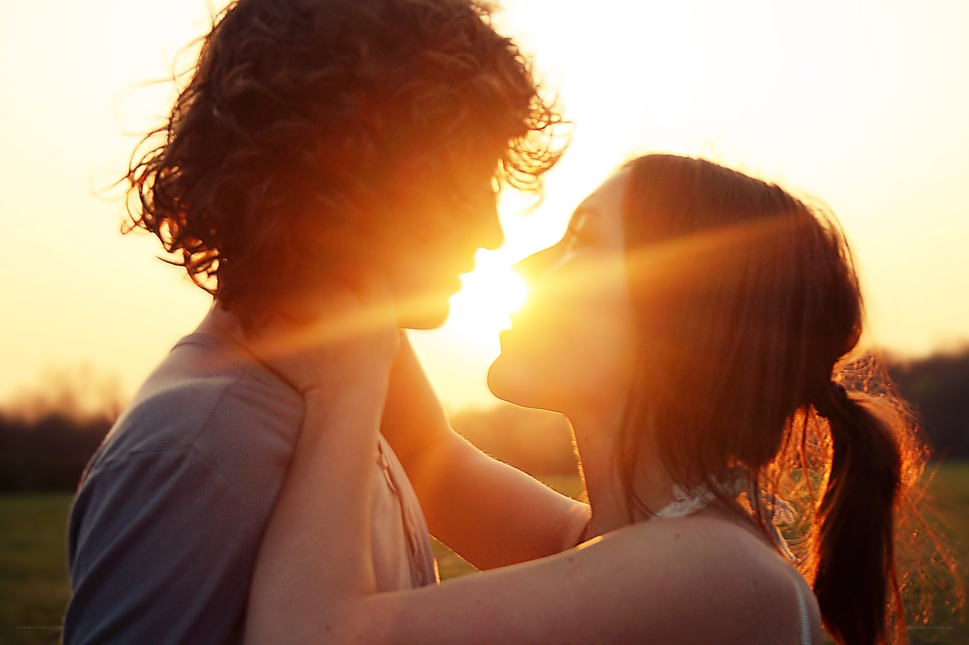 couple in sunset embrace