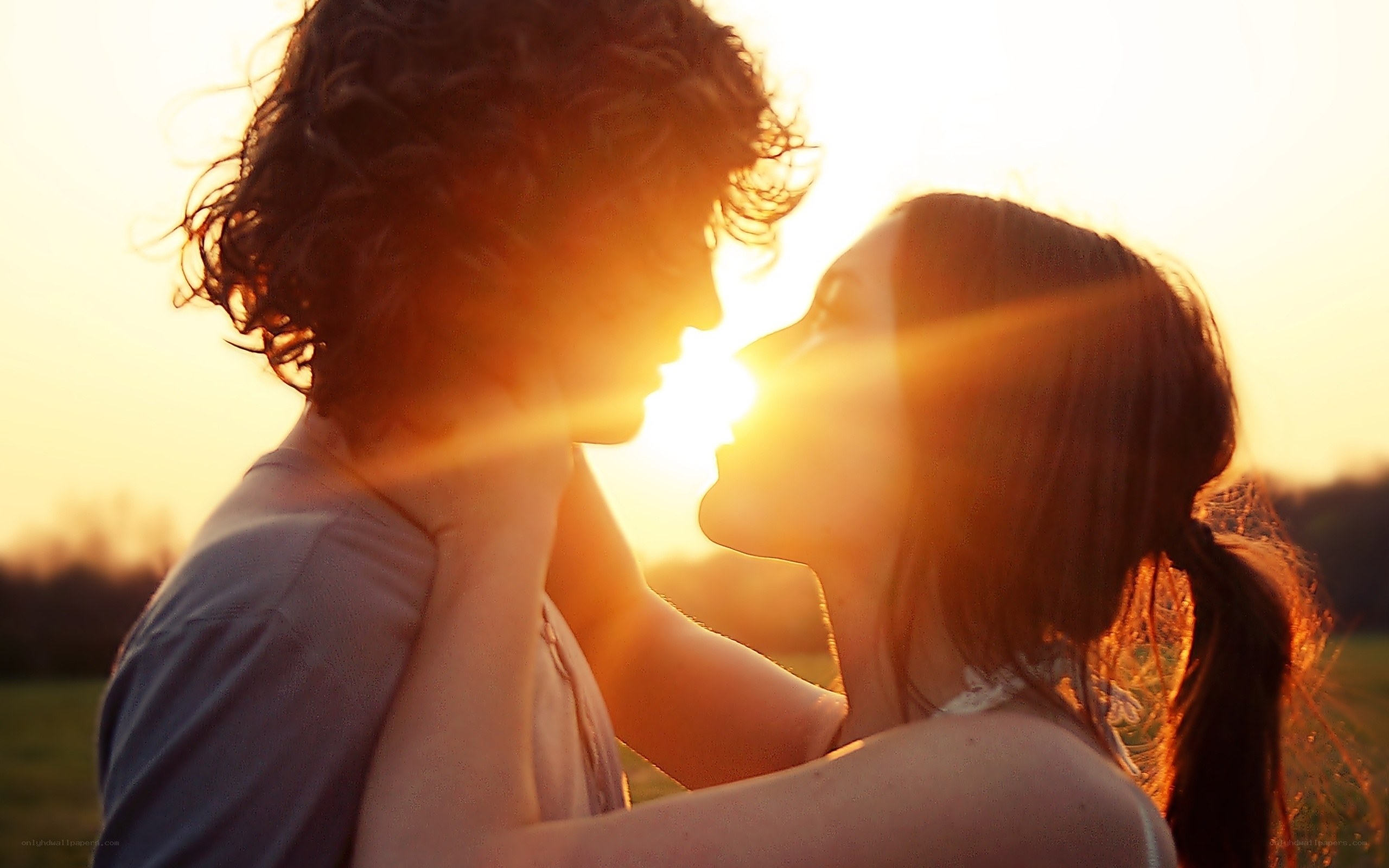 Couple in sunset embrace