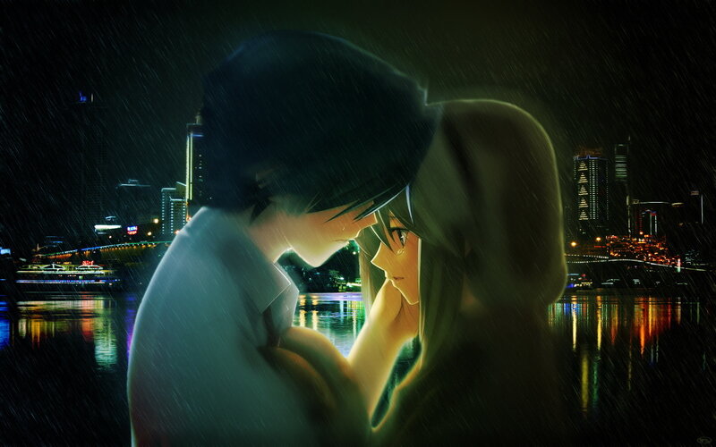Couple in the rain at night