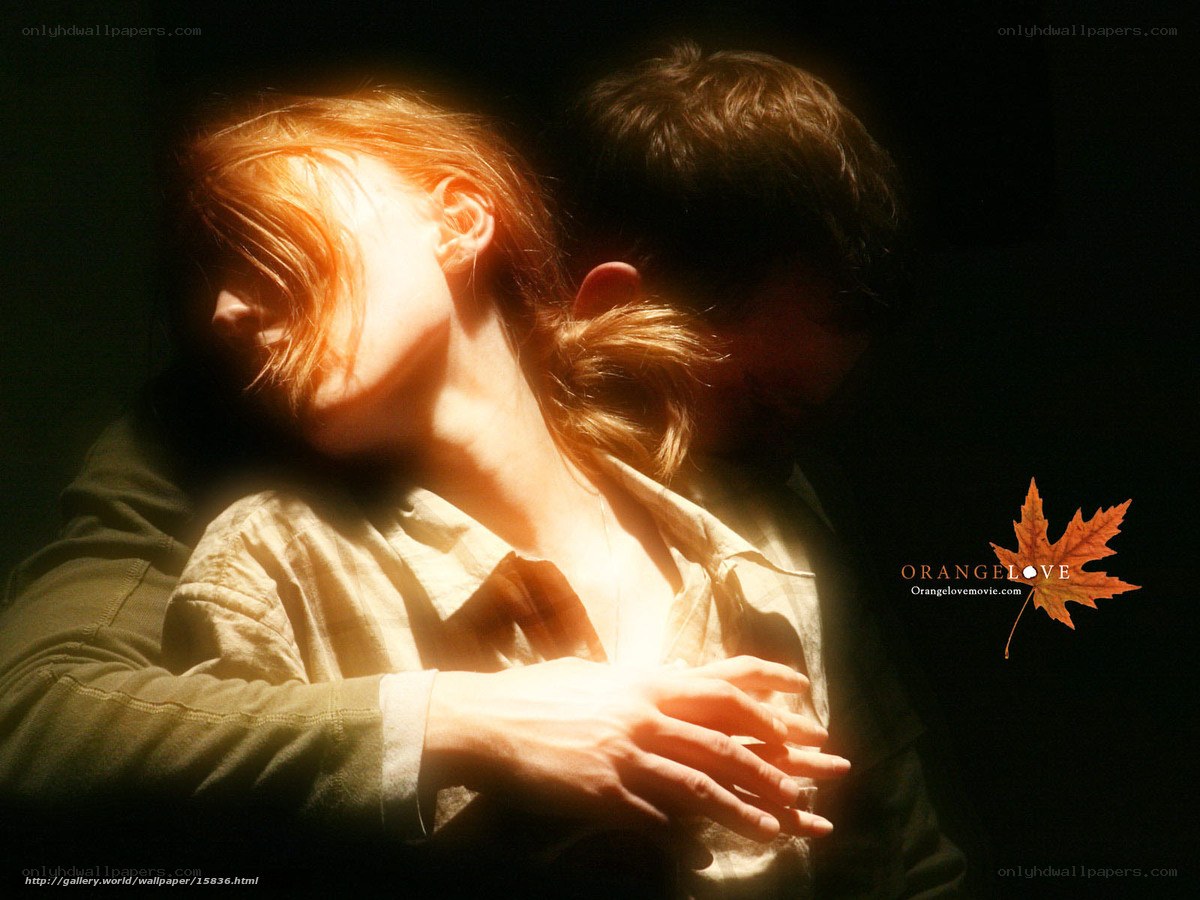 couple in warm light embrace
