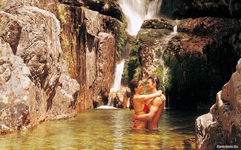 Couple in Waterfall Pool