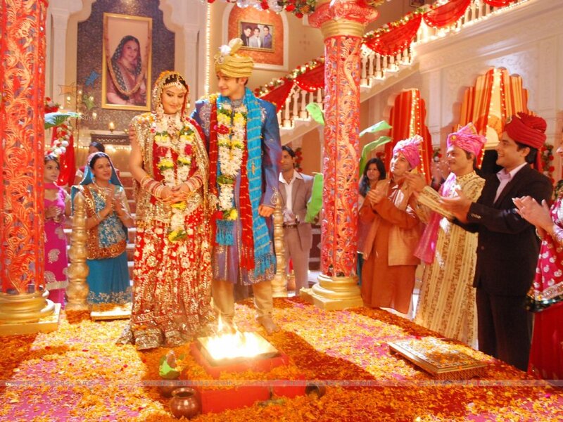 Couple in Wedding Attire — Red, Festive