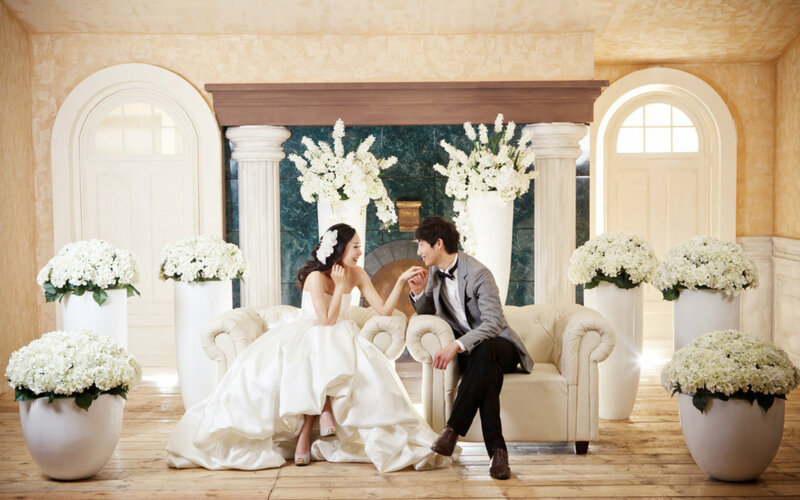 Couple in Wedding Attire — White, Romantic, Photograph, Flowers