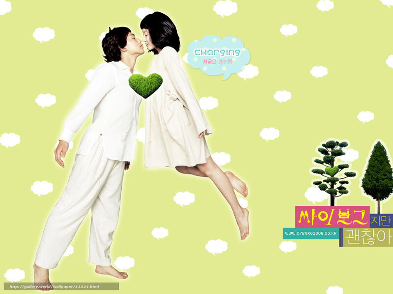 Couple in white pajamas kissing
