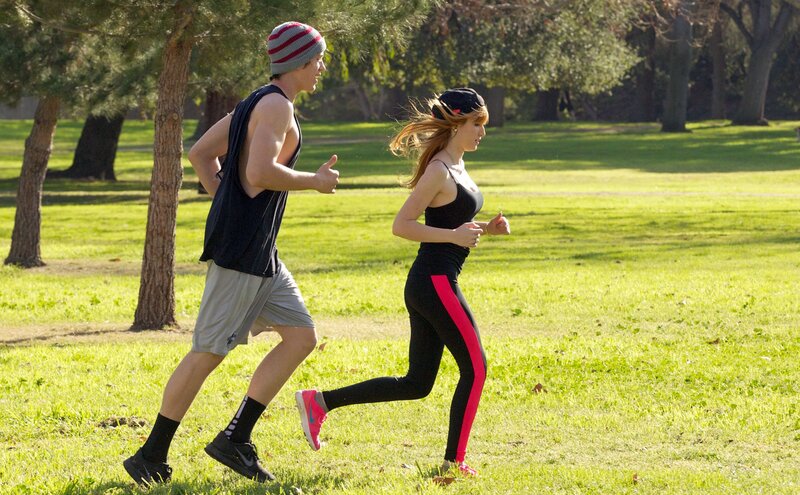 Couple jogging in park
