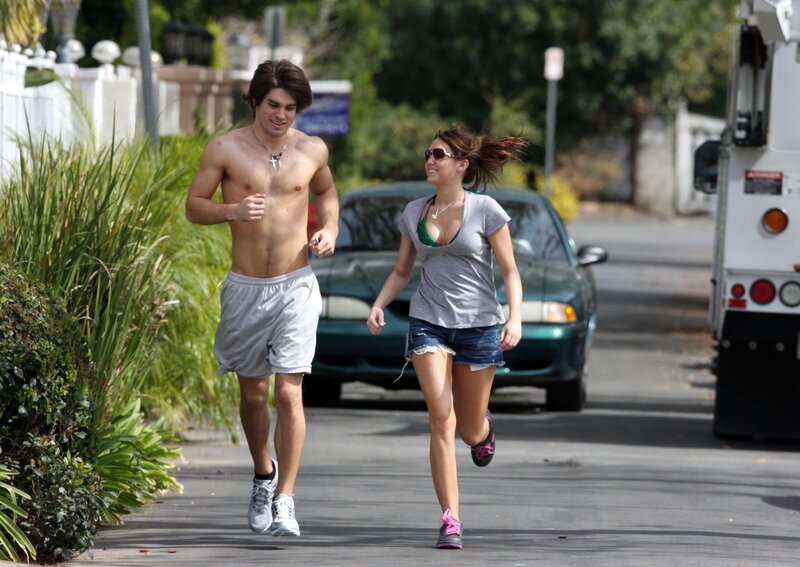 Couple jogging on street