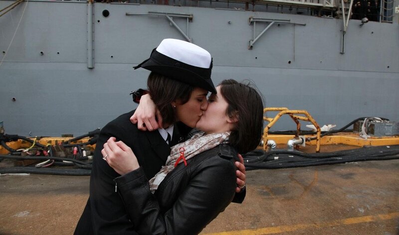 Couple kissing at dock
