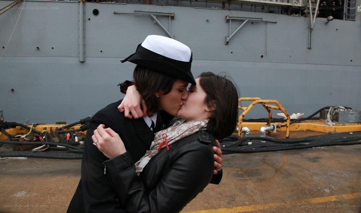 Couple kissing at dock