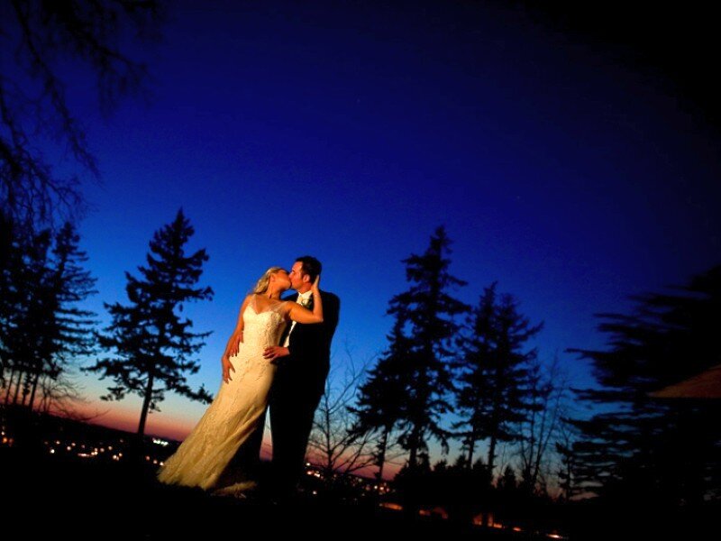 Couple kissing at dusk