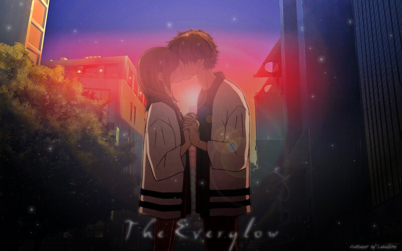 couple kissing at dusk
