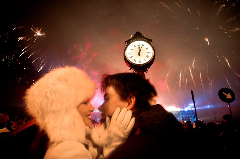 Couple kissing at New Year's